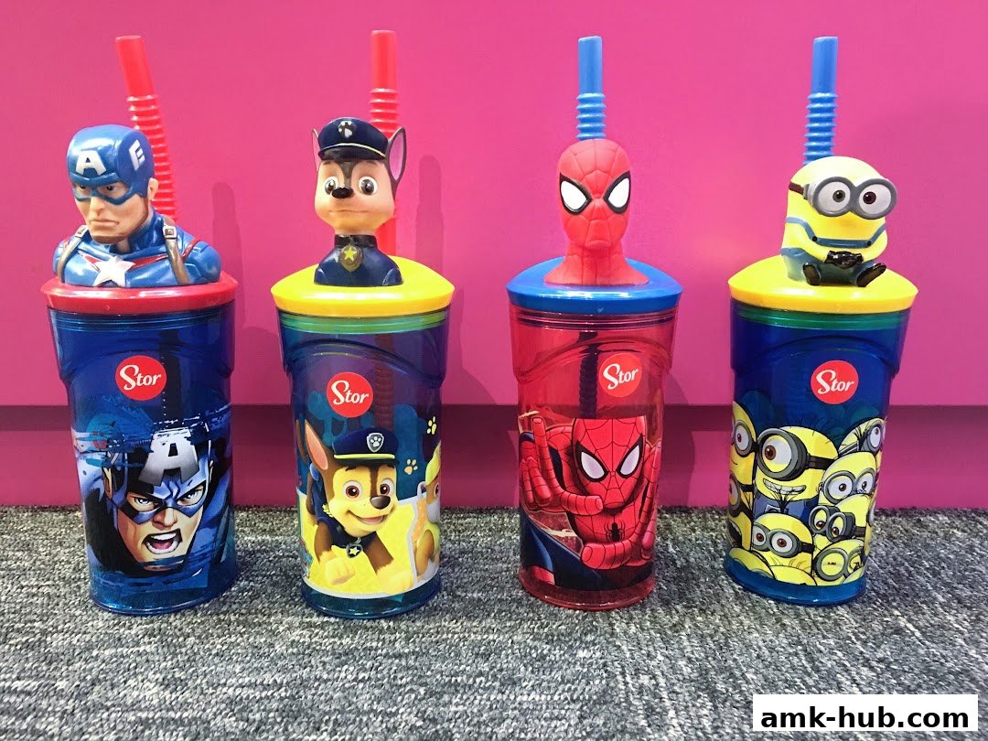 Four character-themed cups with straws, featuring Captain America, Chase from Paw Patrol, Spider-Man, and Minions.