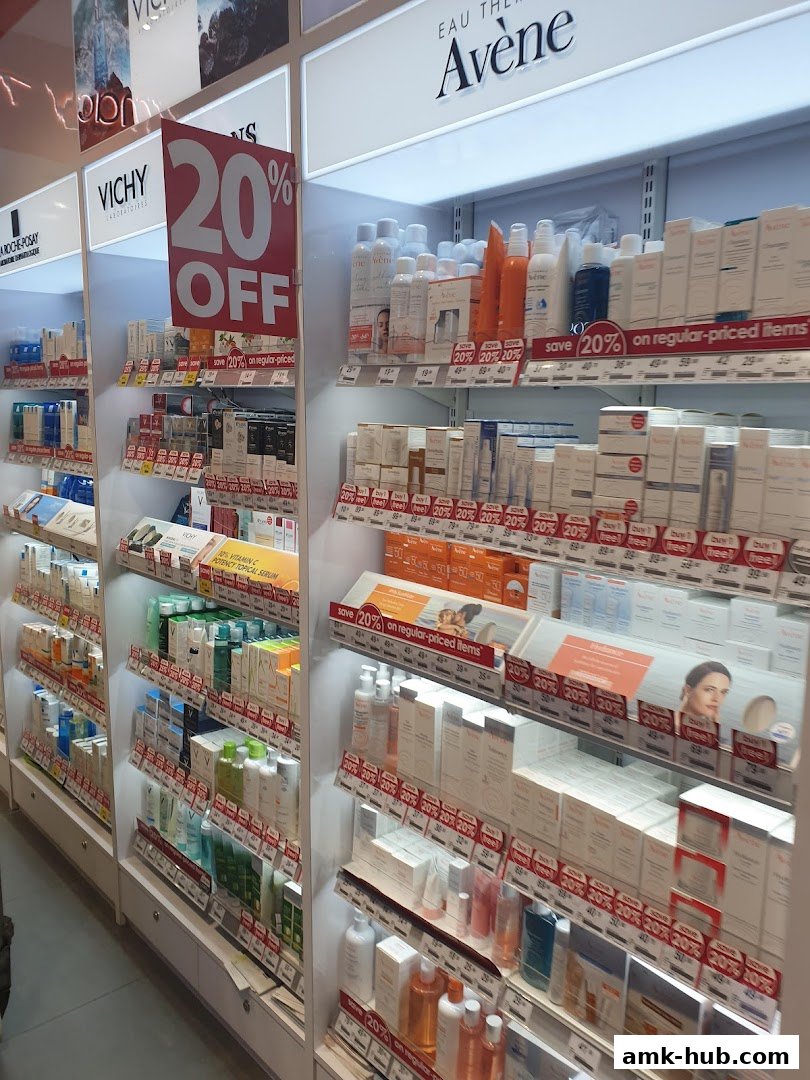 Shelves stocked with various skincare products, featuring prominent 20% off signs.
