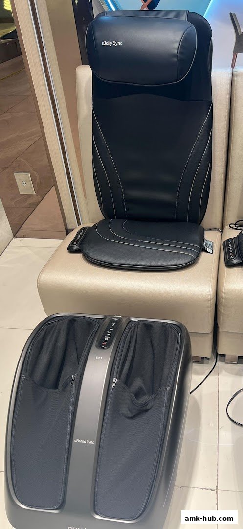 A black OSIM uJolly Sync massage cushion and uPhoria Sync foot massager are displayed.