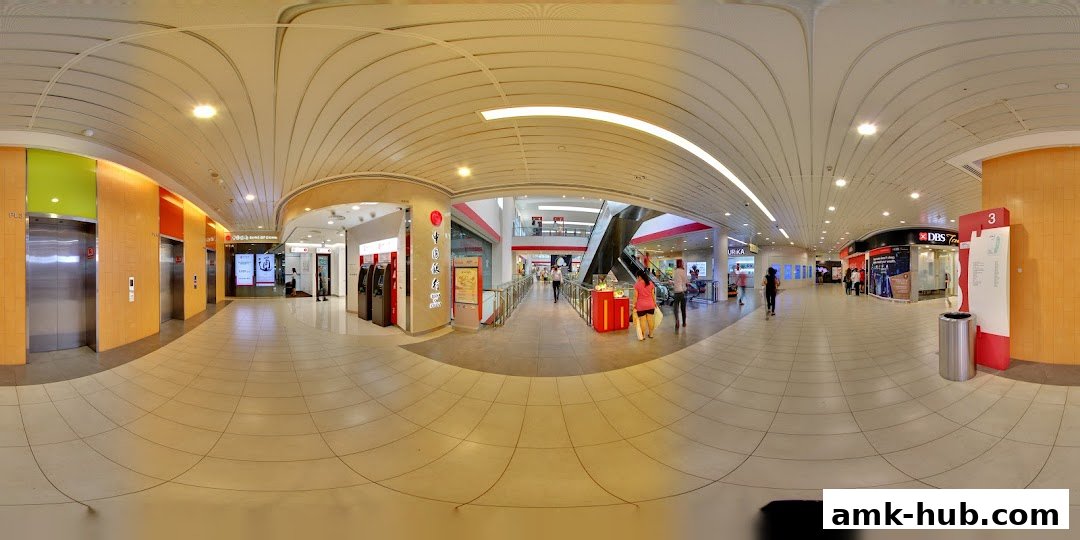 A panoramic view of a shopping mall corridor with the Bank of China and DBS Bank branches visible.
