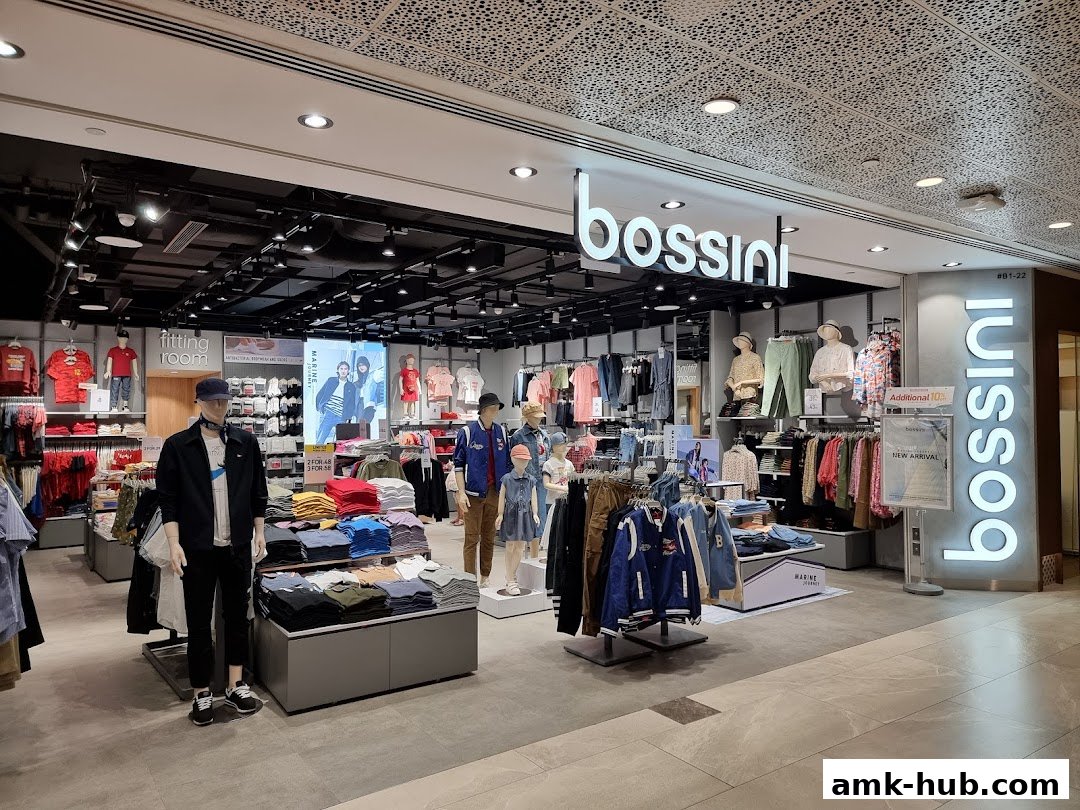 Interior view of a Bossini clothing store showcasing apparel on racks and displays.