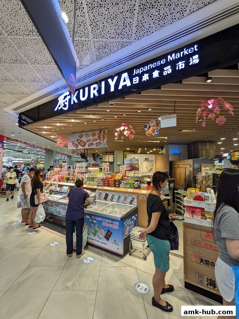 The entrance of Kuriya Japanese Market with customers browsing.