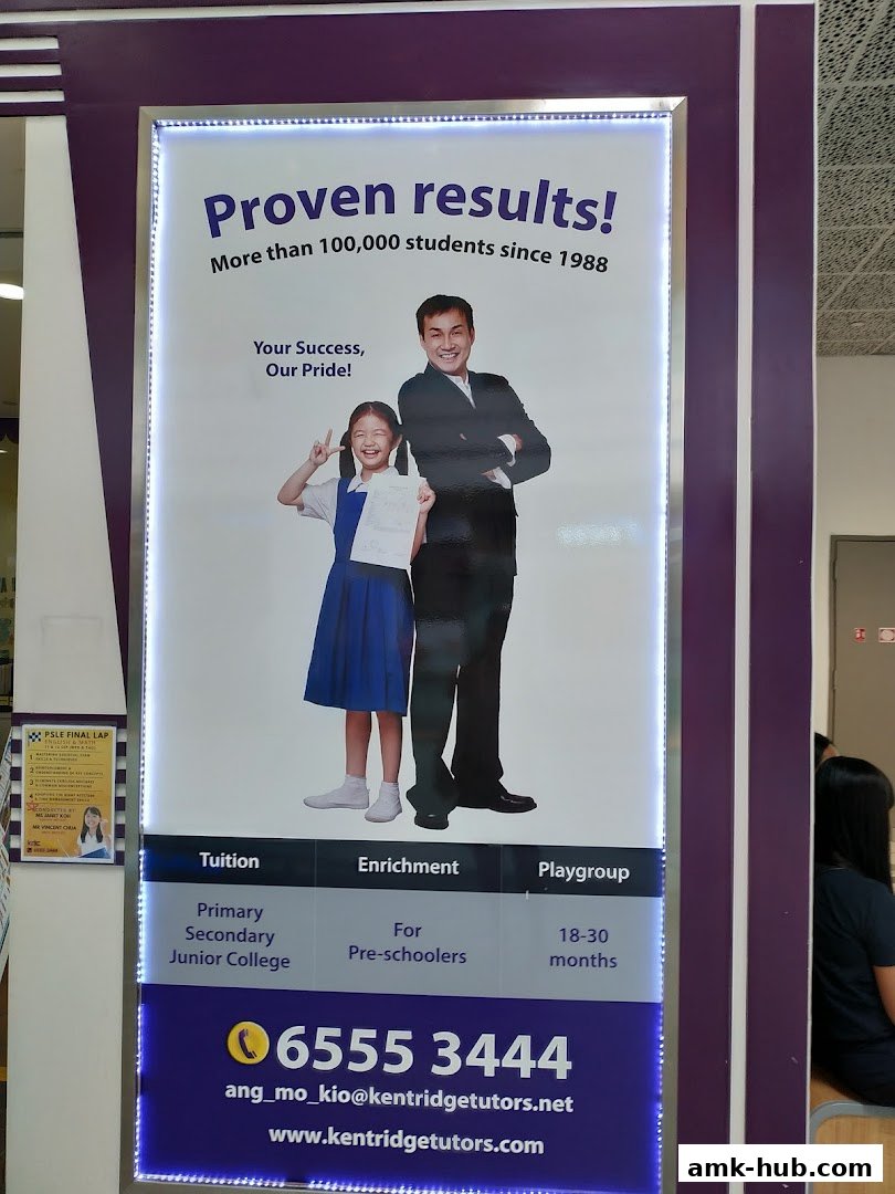 A poster for Kent Ridge Tutors showing a teacher and student with educational program details.