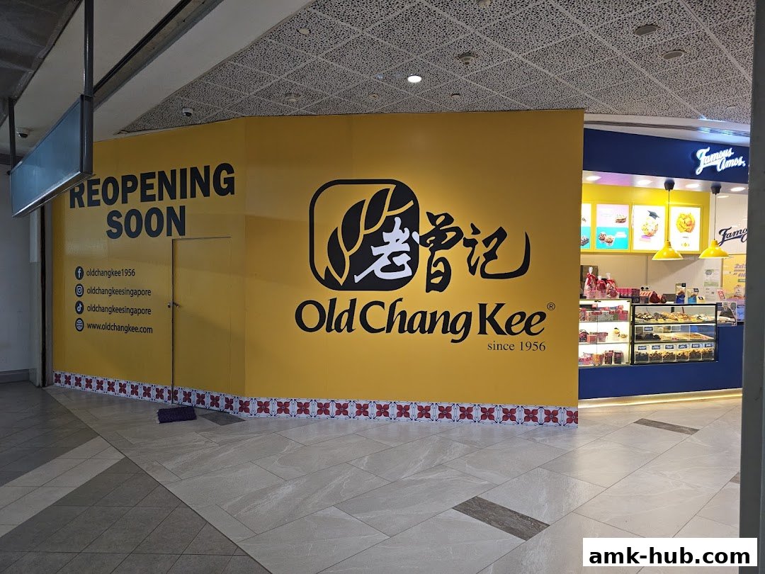 Old Chang Kee shop front with 'Reopening Soon' signage and social media handles.