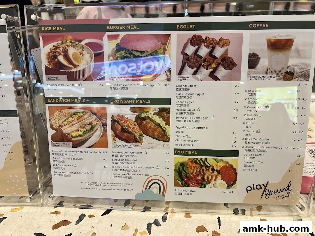 A menu board displaying various meals, egglets, and coffee options with enticing images.