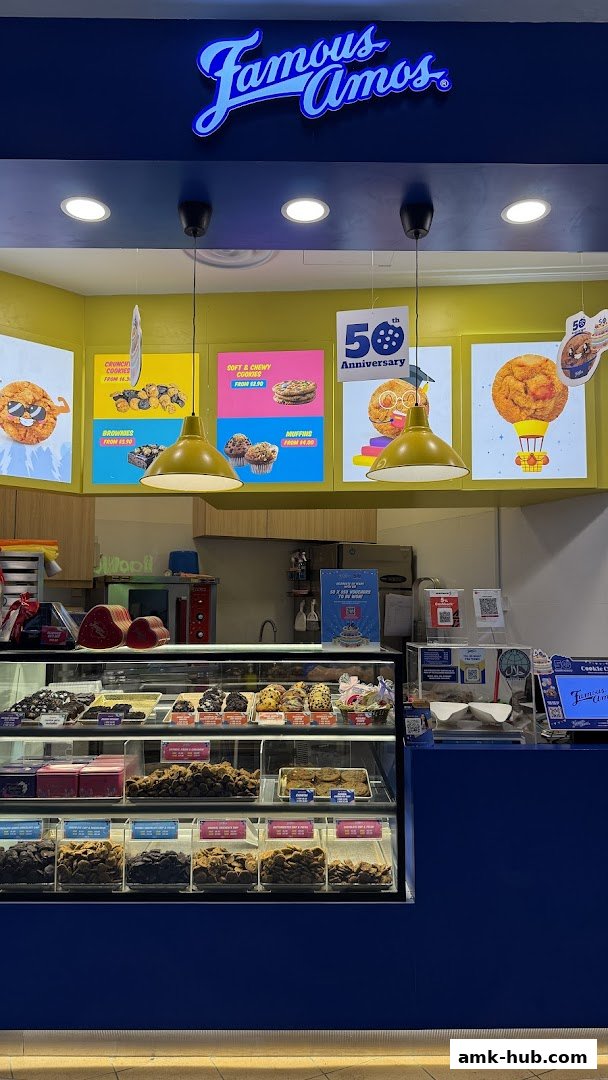 Famous Amos cookie shop with a display of various cookies and baked goods.