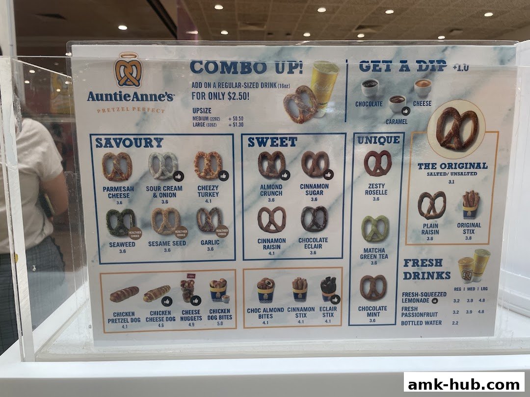 Auntie Anne's pretzel menu featuring savory, sweet, unique, and original pretzels, plus chicken items and drinks.