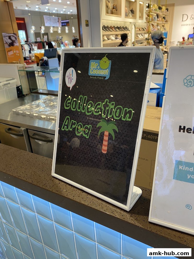 A sign for Mr. Coconut's collection area with a palm tree graphic.