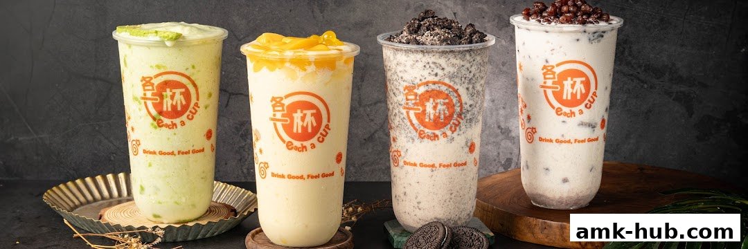 Four colorful bubble tea drinks with various toppings and the shop's logo.