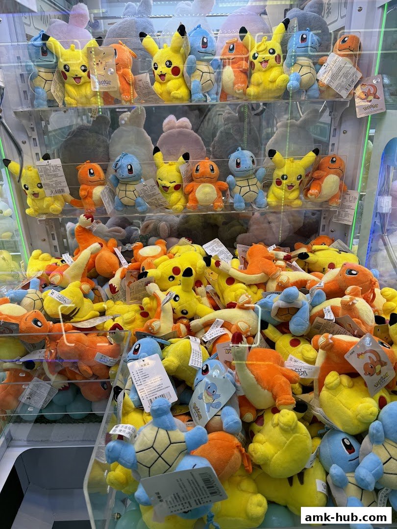A claw machine filled with various Pokemon plush toys, including Pikachu, Squirtle, and Charmander.