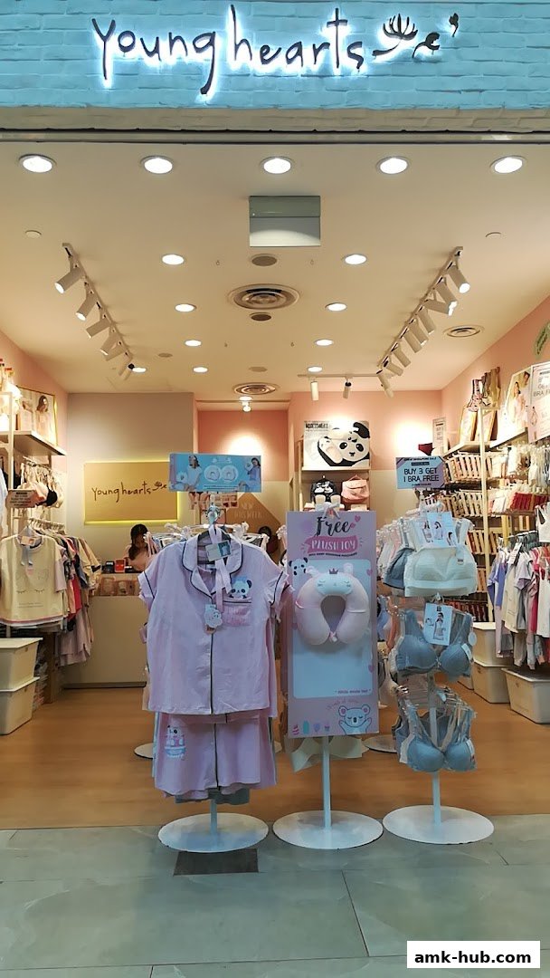 The entrance of a Young Hearts lingerie and sleepwear store displaying pajamas and bras.
