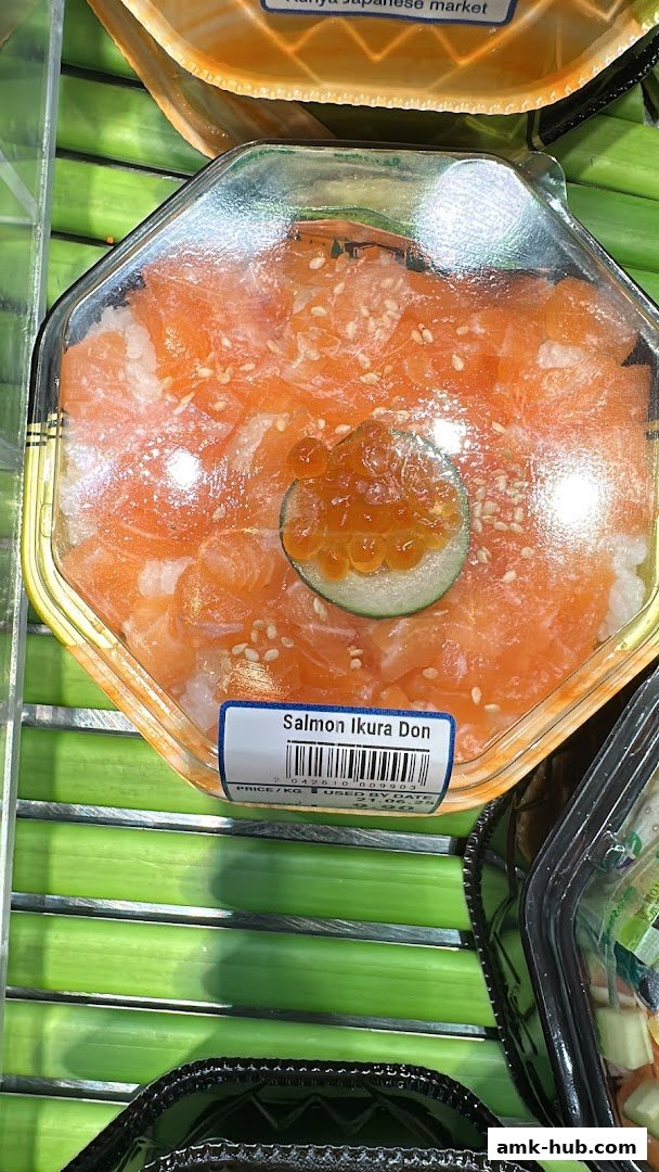 A close-up of a Salmon Ikura Don dish from Kuriya Japanese Market.