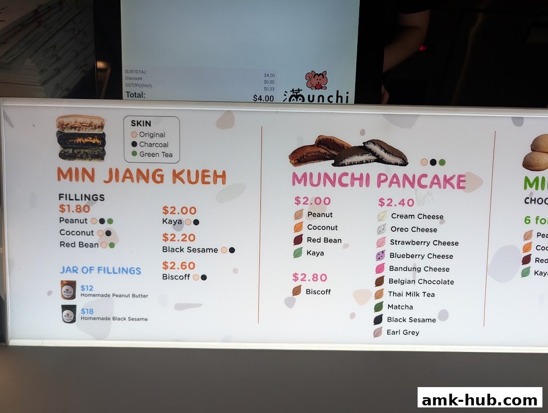 A menu board displaying various pancake and kueh fillings and prices.