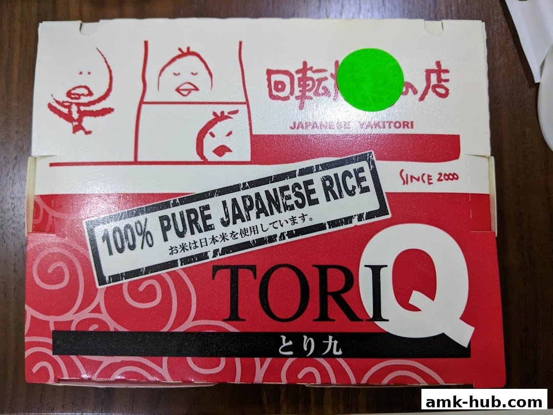 A red and white box with Japanese text and cartoon characters, advertising TORI-Q.