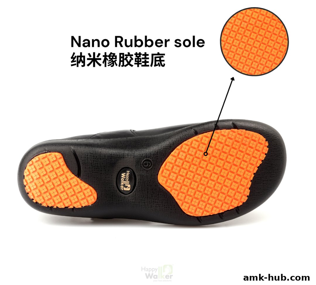 A black shoe sole with orange textured grip pads and text indicating 'Nano Rubber sole'.