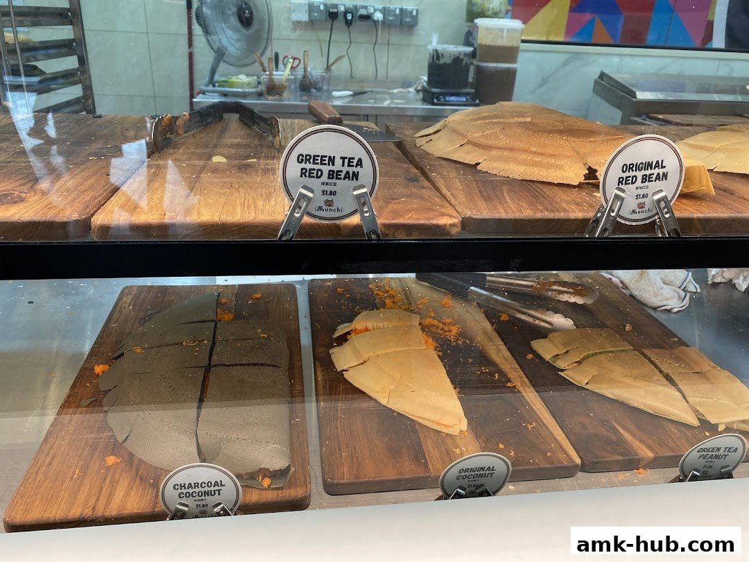 Display of various freshly made pancakes with different fillings and flavors.