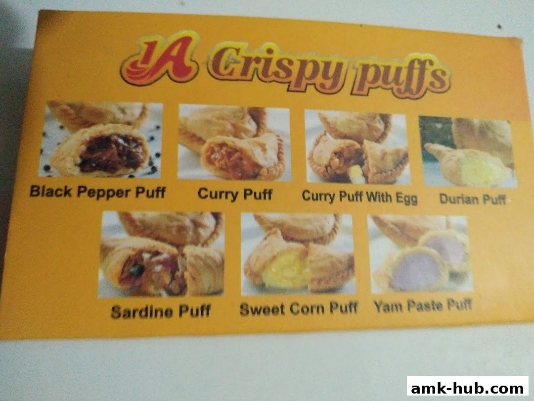 A display of various crispy puff pastries with different fillings.