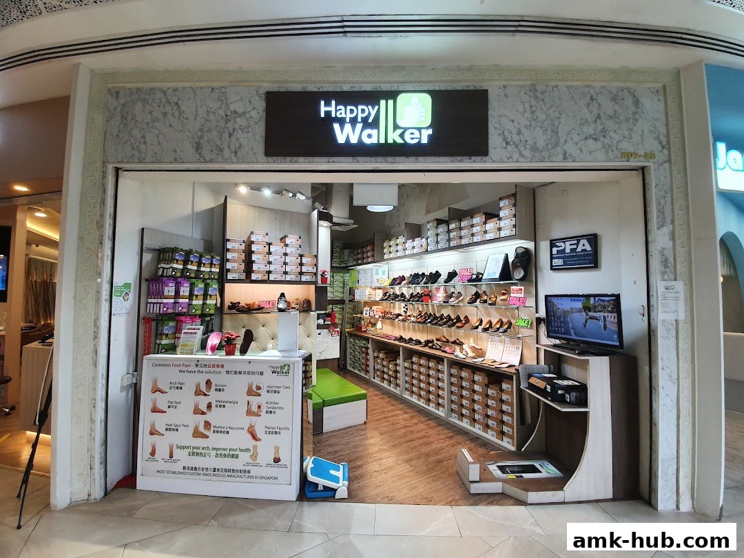 The entrance of Happy Walker shoe store, showcasing various footwear and foot care products.