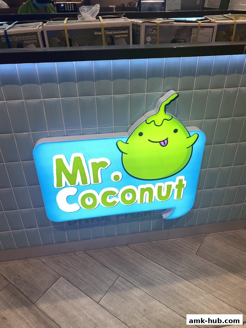The Mr. Coconut shop sign with a cute coconut character.