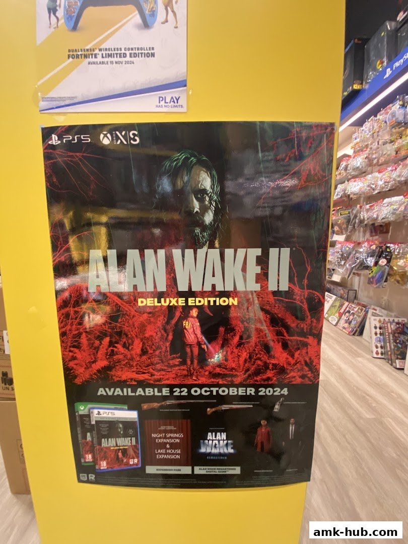 A poster for the video game Alan Wake II Deluxe Edition is displayed on a yellow wall.
