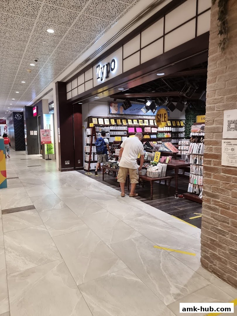 A view of the Typo shop entrance with customers browsing inside.