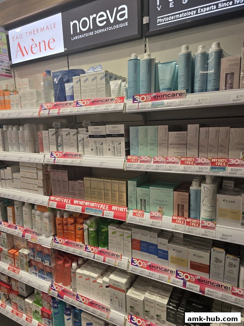 Shelves stocked with various skincare products from brands like Avène, Noreva, and GNC.