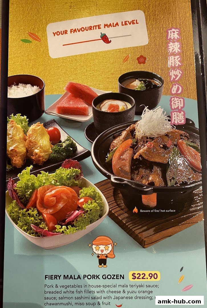A menu item featuring Fiery Mala Pork Gozen with various side dishes.