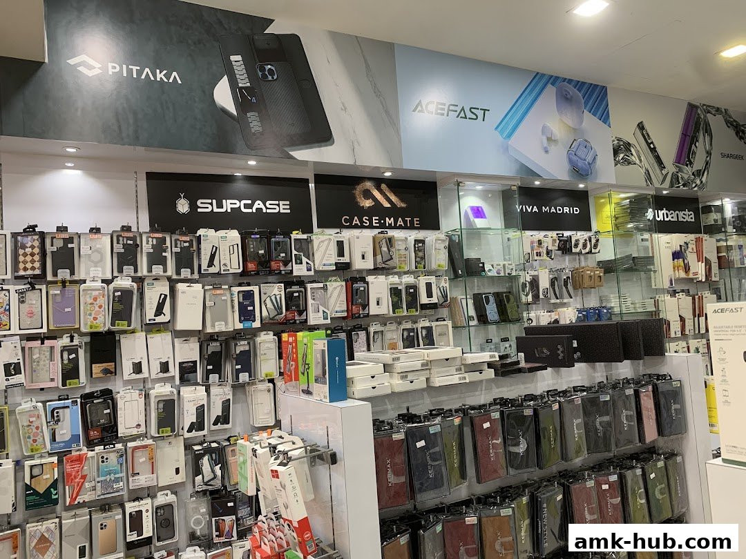 A wide selection of phone cases and accessories displayed on shelves in a retail store.