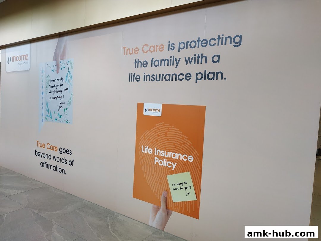 A wall display for Income Insurance promoting life insurance plans with personal testimonials.
