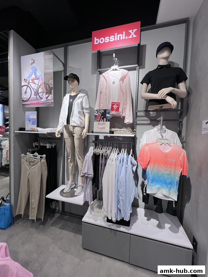 Mannequins display casual wear and activewear from Bossini.X, with sale signs visible.