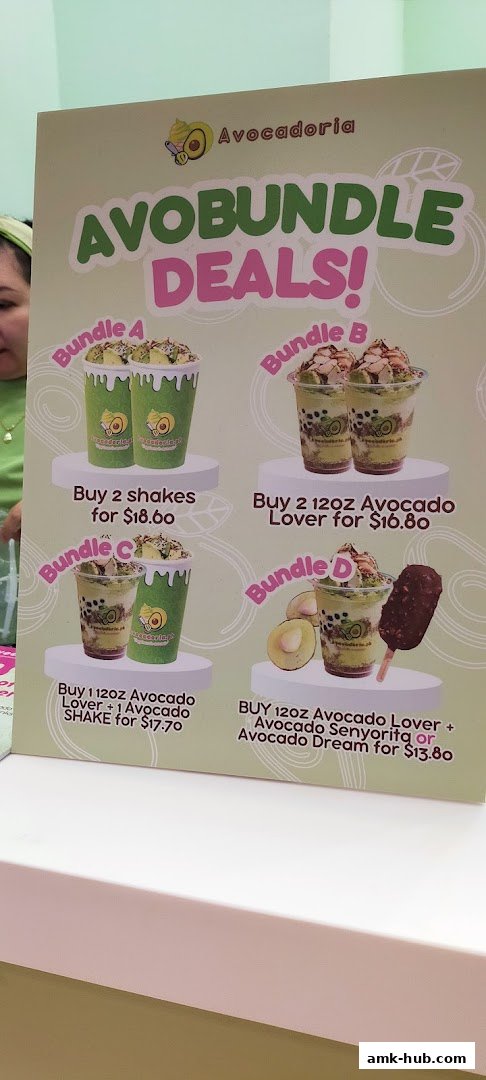 A sign displaying Avocadoria's 'Avobundle Deals' with four different bundle options.