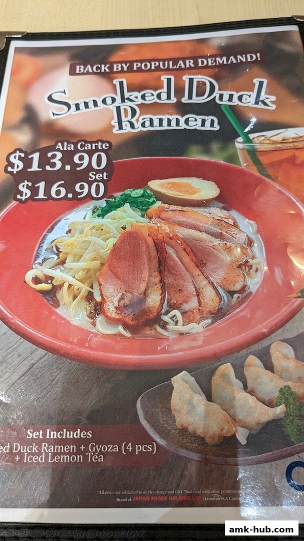 A menu item featuring Smoked Duck Ramen, with prices for ala carte and set options.