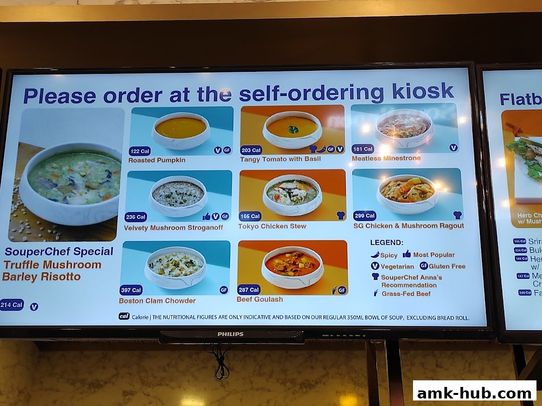 A digital menu displaying various soup options with images, calories, and dietary information.