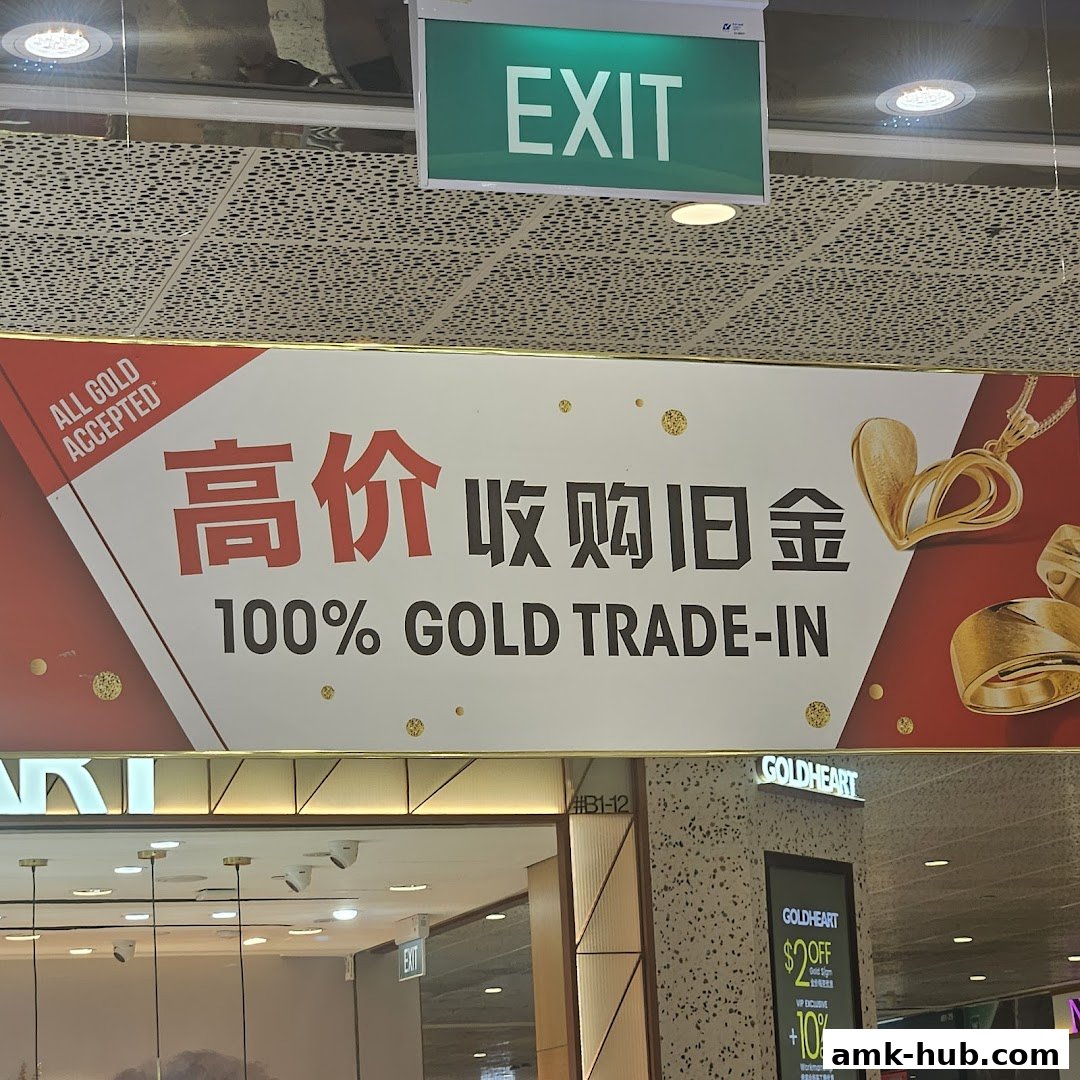 A banner advertises a 100% gold trade-in service with images of gold jewelry.