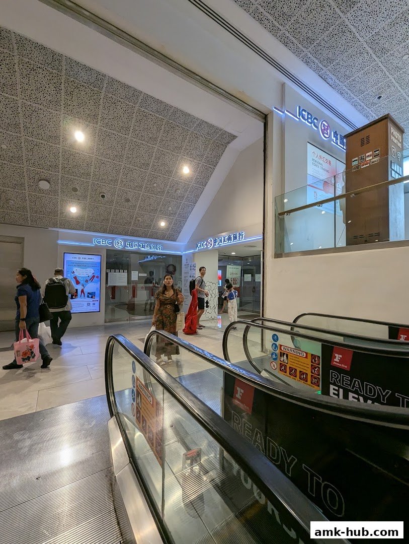 The ICBC Ang Mo Kio Sub-Branch entrance with escalators in the foreground.