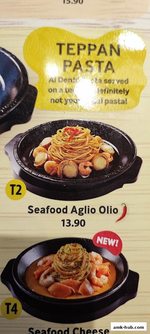 A menu featuring Teppan Pasta dishes, including Seafood Aglio Olio and Seafood Cheese.