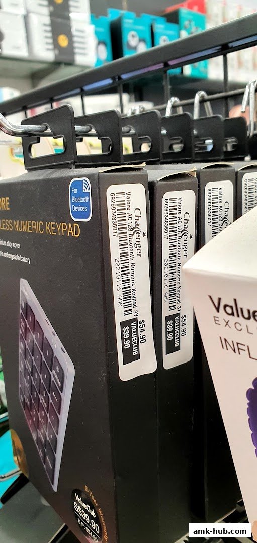 Close-up of Bluetooth numeric keypads on display at Challenger Ang Mo Kio Hub.