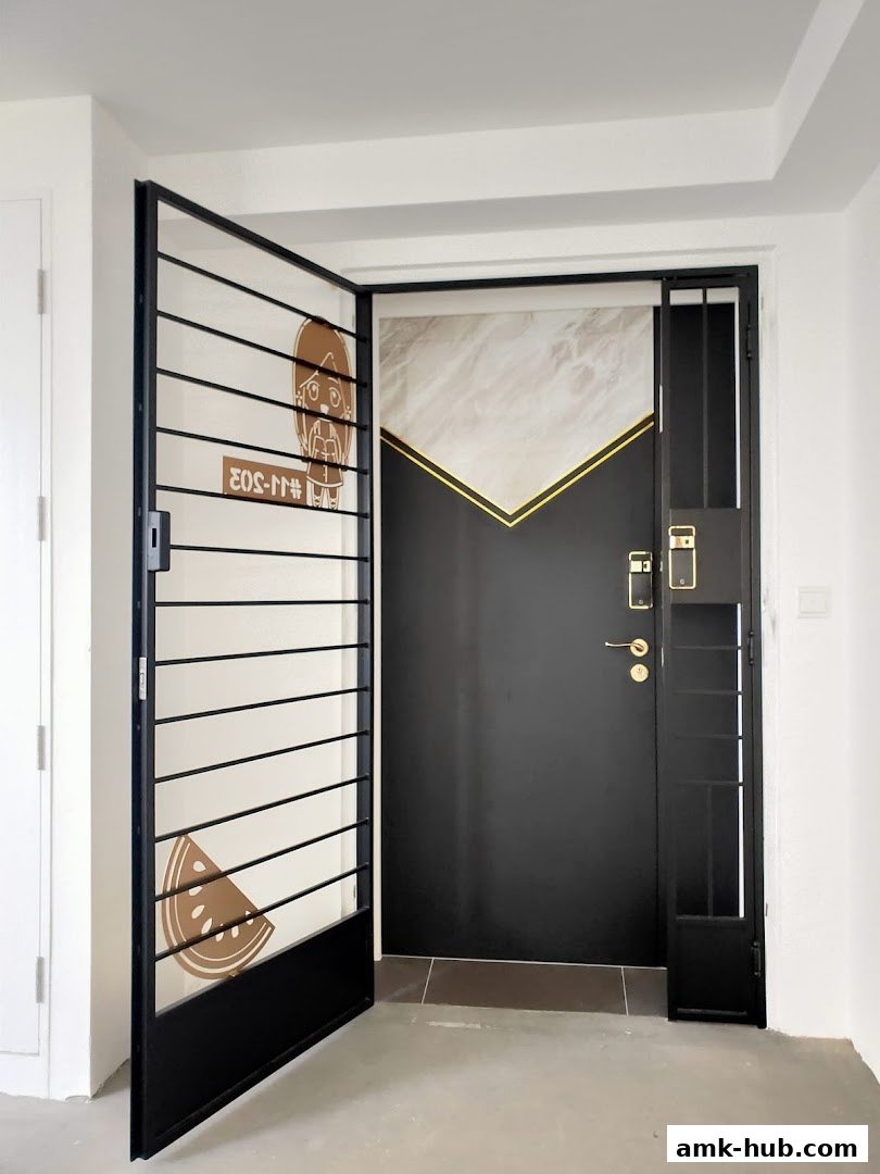 A modern black metal gate and door with decorative elements and digital lock.