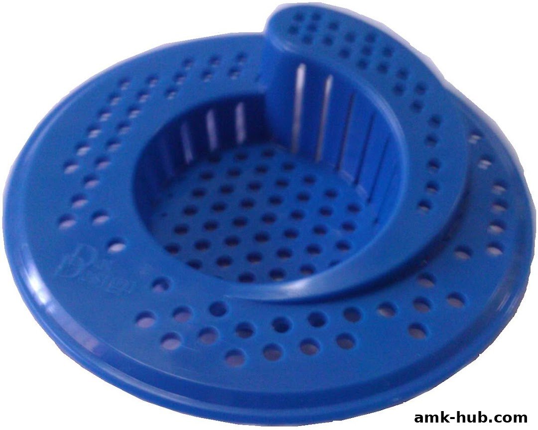 A blue plastic drain cover with a unique spiral design and numerous perforations.