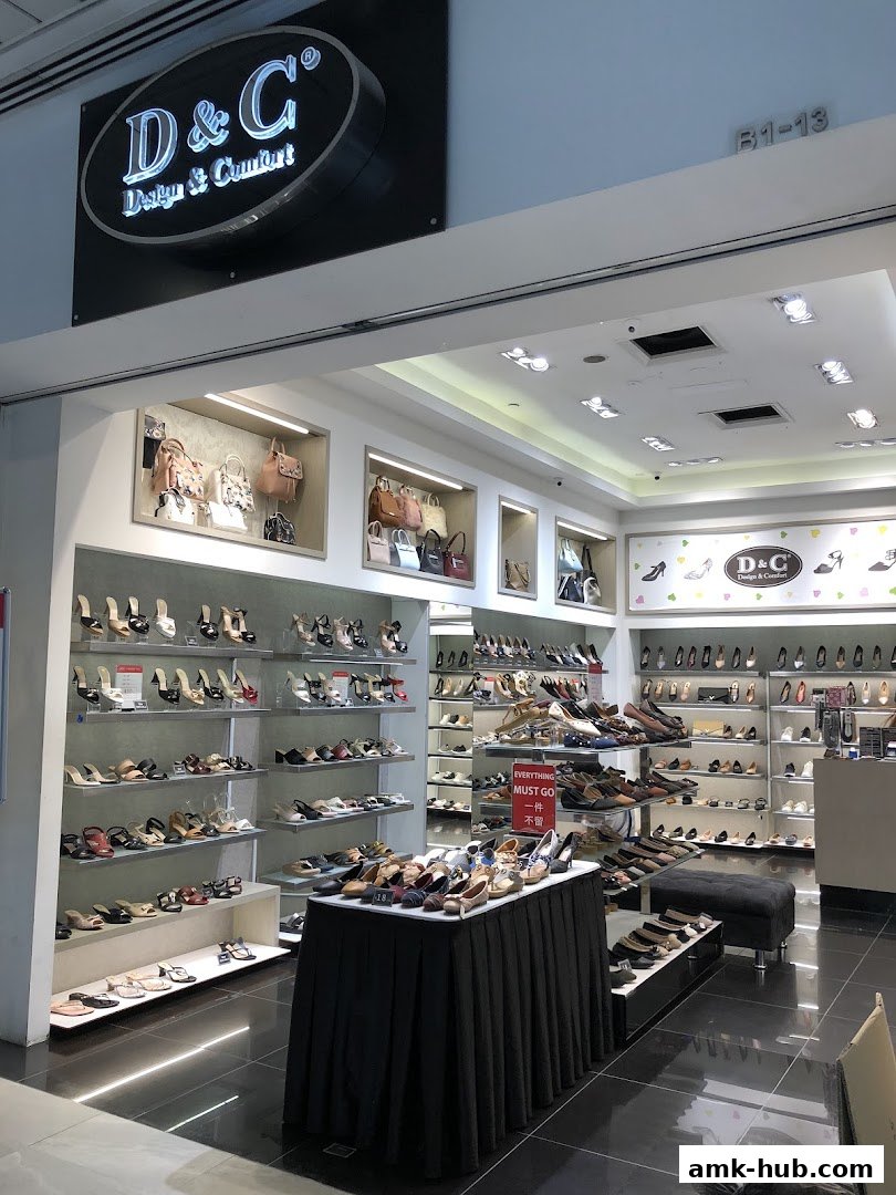 Interior view of a D&G shoe store showcasing a wide variety of women's footwear.