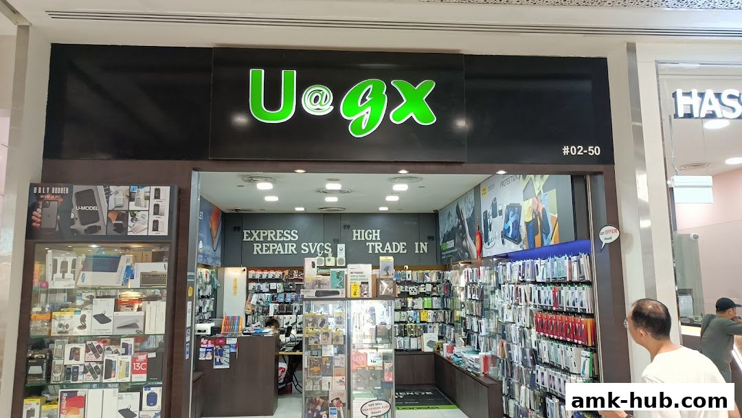 The exterior of a mobile phone accessories and repair shop called UGX.