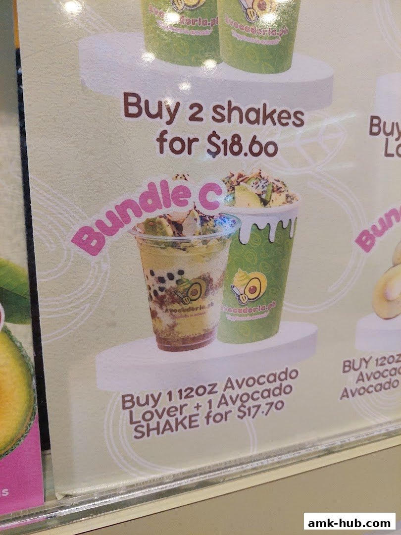 A menu board displaying avocado shake bundle deals and prices.