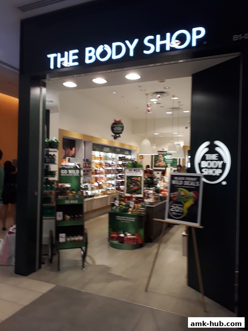 The entrance to The Body Shop, showcasing its products and a "Black Friday Wild Deals" sign.