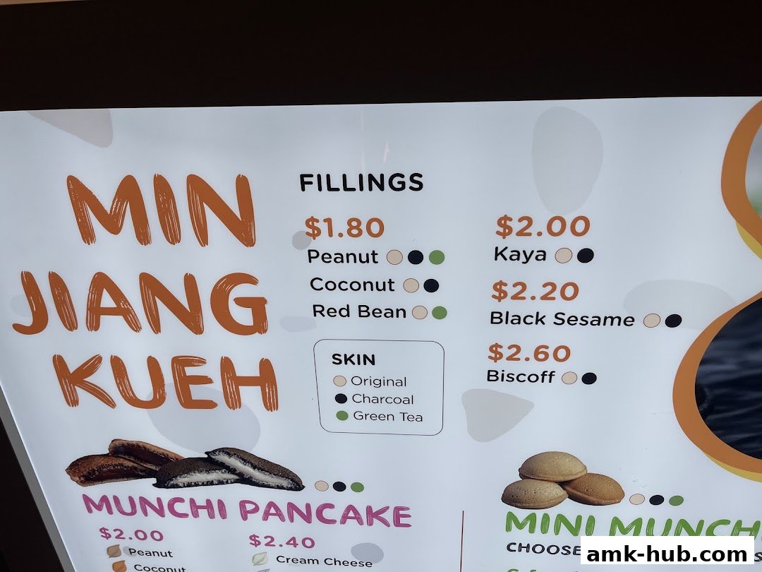 A menu board for Munchi Pancakes, showcasing various fillings and pancake options.