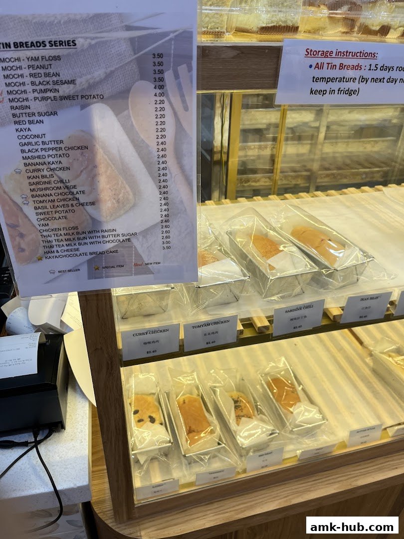 A menu for Thai Baang featuring a variety of tin breads and their prices.