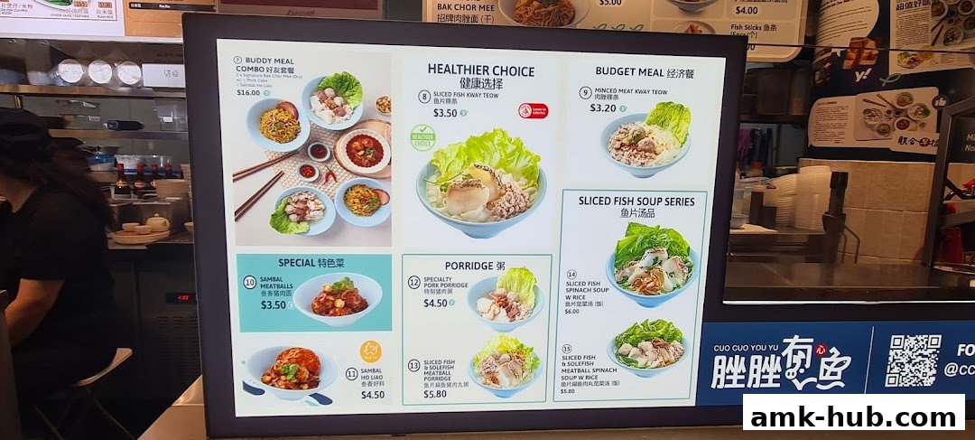 A brightly lit menu board displays various noodle and porridge dishes with appetizing images and prices.