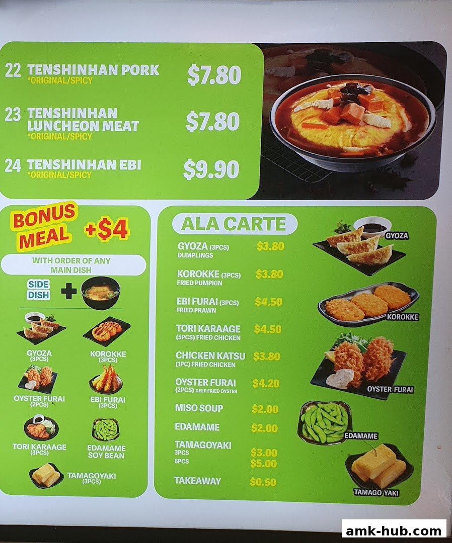A menu board for Kopitiam featuring various Japanese-inspired dishes and meal deals.