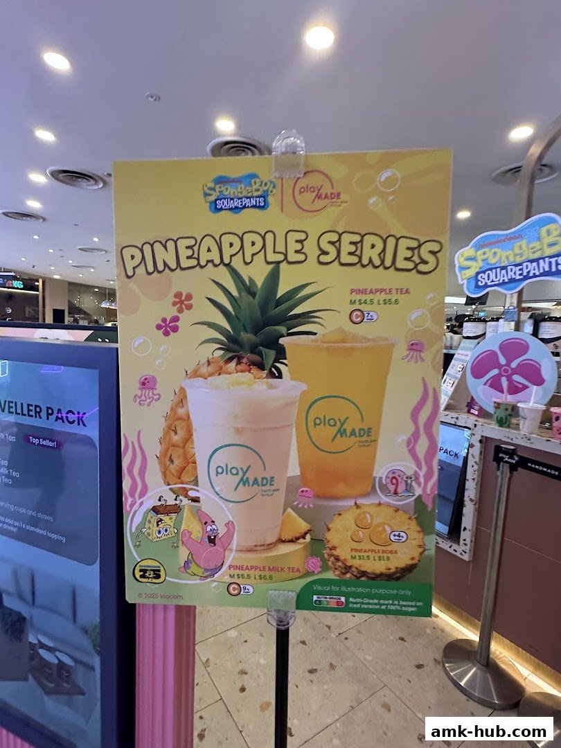 A promotional sign for PlayMade's Pineapple Series drinks featuring Spongebob.