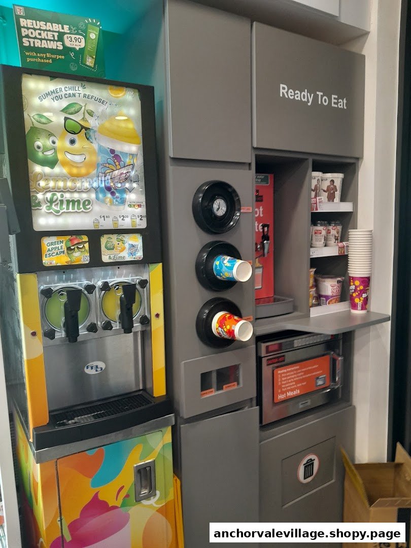 An interior shot of 7-Eleven featuring a Slurpee machine and a self-serve hot food and drink station.