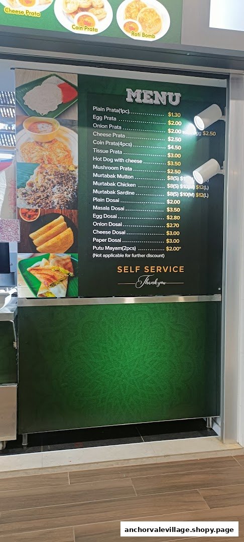 A vibrant green menu board displaying a variety of Indian Muslim food items and prices.